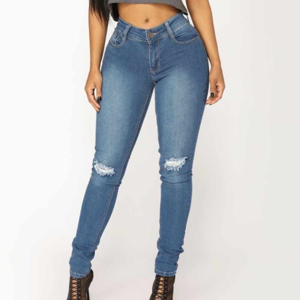 Knee rip skinny jeans